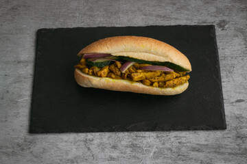 Indian Surinamese sandwiches filled with roti chicken curry,  cod fish or tandoori chicken 