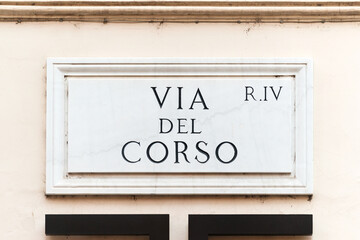 Via del Corso street sign on the main street of Rome, famous for shopping, Italy