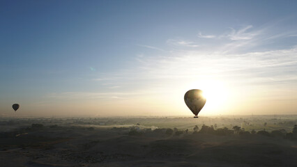 Luxor Egypt balloon riding scene at Valley of the king tourist attraction