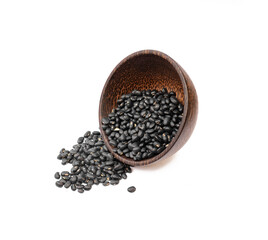 Black beans in wooden bowl on white background