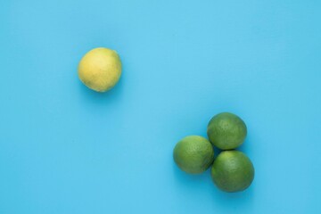 Natural fresh lime isolated on blue background