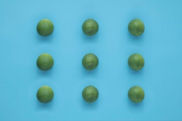 Natural fresh lime isolated on blue background
