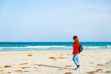 A person standing on a beach