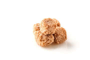 Cane Pure sugar cubes isolated on white background. Selective focus.