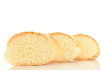 Three slices of fragrant bagels sprinkled with sesame seeds, close-up, isolated on white.