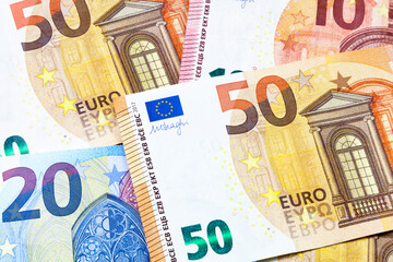 Close-up on a stack of euro banknotes.