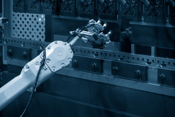 The hi technology metal forming by robotic system with hydraulic press brake bending machine. The...