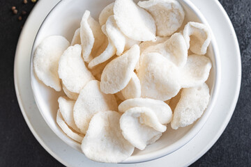 tapioca chips flour or rice chips meal snack copy space food background rustic. top view keto or paleo diet vegan or vegetarian food