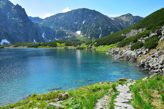 A pathway at lake Czarny staw pod Rysami, near lake Morskie oko. Poland.