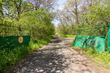 open gates to path in the park