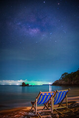 Landscape with Milky way galaxy. Night sky with stars and milky way over sea and mountain.