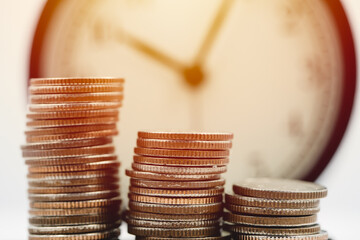 Money with the clock. Business Times wealth income concept.