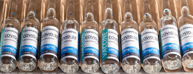 banner with Covid-19 Corona Virus 2019-ncov vaccine vials medicine drug bottles. Vaccination,...