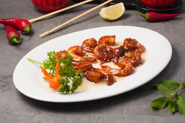 fried shrimp in a sauce. chinese cuisine