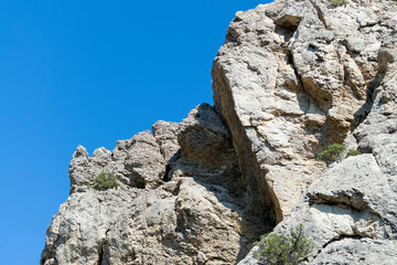 Crimean rocks and sky. Sunny autumn day. Front view