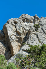 Crimean rocks and sky. Sunny autumn day. Front view