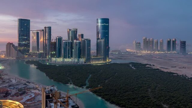 Buildings on Al Reem island in Abu Dhabi timelapse from above.