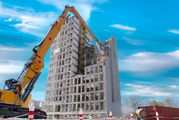 Demolition of the old building with sloopkraan. residential house, highrise building at...