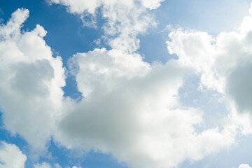 Obraz premium gray and white clouds floating under a blue sky