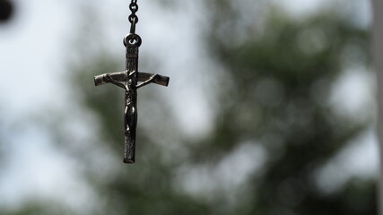 Obraz premium Jesus Cross pendant with bokeh background.Concept Jesus redemption.Power of Jesus.Christianity background