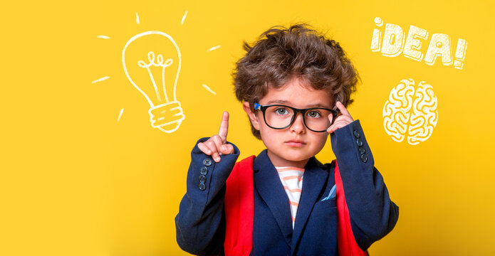 Small smart child in glasses with bag isolated on yellow. Little genius student thinking with lightbulb and math formulas. Student has idea. Pupil with picture of brain. Kindergarten kid go to school