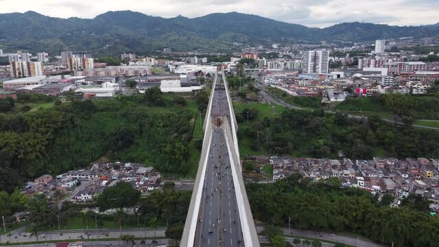 Pereira, Risaralda Colombia - April 28, 
 2021: Aerial View of a march of Colombians demanding rights and against tax reform Viaducto C&eacute;sar Gaviria Trujillo