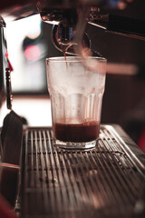 espresso machine pouring coffee