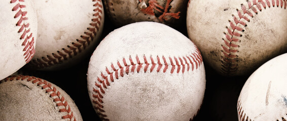 Group of baseball balls close up for sports banner.