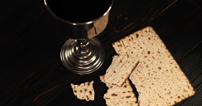holy communion chalice with wine and bread. Super slow motion