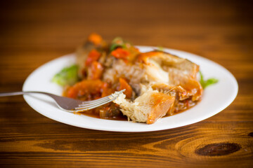 whole fish hake stewed with carrots, beets, peppers and other