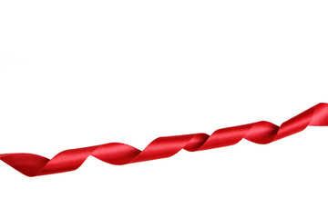 Red ribbon twisted in a spiral on a white background.