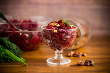 dietary salad of boiled beets with walnuts