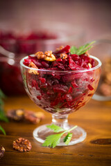 dietary salad of boiled beets with walnuts