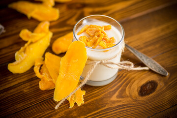 homemade sweet yogurt in a glass with mango