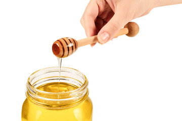 Dipper with honey in woman hand. Space for text or design.