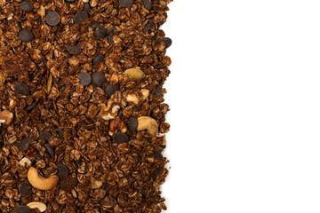 Chocolate granola cereal with nuts background.