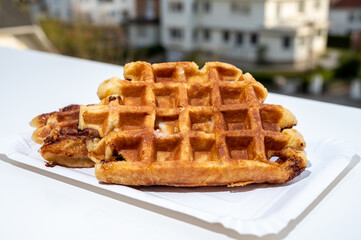 Belgian sugar waffles with black coffee served outdoor