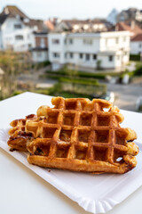Belgian sugar waffles with black coffee served outdoor