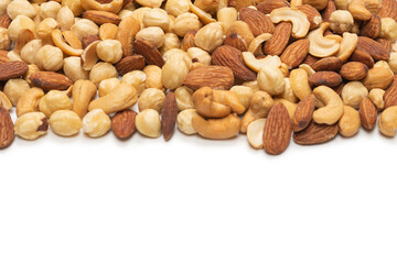 Mix of nuts isolated on white background. Top view.