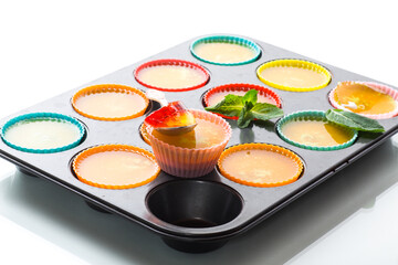 lot of colored sweet fruit jelly in a glass