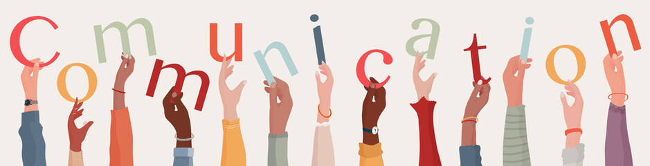 Arms raised of group of diverse multiethnic people holding letters in hand forming the word text communication.Community or teamwork.Communication and agreement between colleagues.Friends