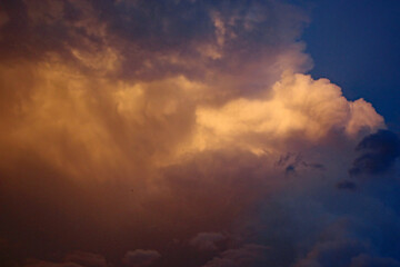 Fototapeta na wymiar Storm clouds in the evening light 
