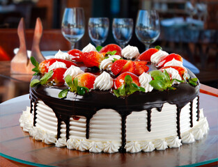 Cake with chocolate and strawberry icing