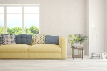 White living room with sofa and summer landscape in window. Scandinavian interior design. 3D illustration