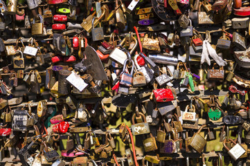 lot of locks, different color and the size. A wall of the closed locks.