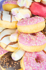 Sweet pochiki, muffins, sweets, close-up. There is a place for text Concept of a sweet gift, congratulations on the holiday.