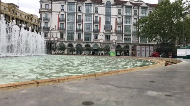 Time lapse at the fountain of Zorrilla Square, at Valladolid, Spain, in April 2021