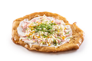 Crusty hungarian langos with cream, ham, grated cheese, corn and greased with garlic.