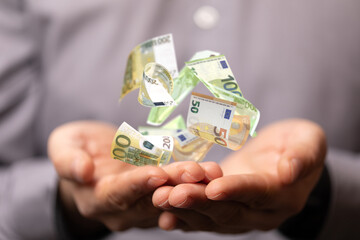 cashflow euro banknote bill in hand