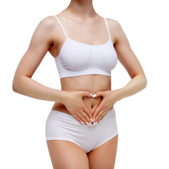 Slim woman in white underwear forming a heart symbol with her hands on her belly, isolated on white background